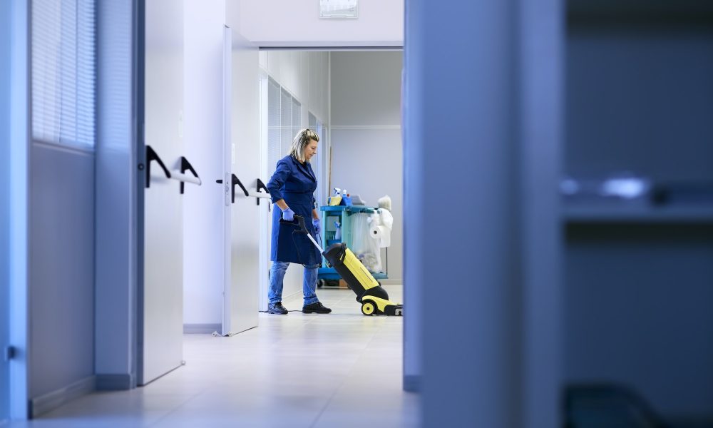 Women At Workplace Professional Female Cleaner Washing Floor In